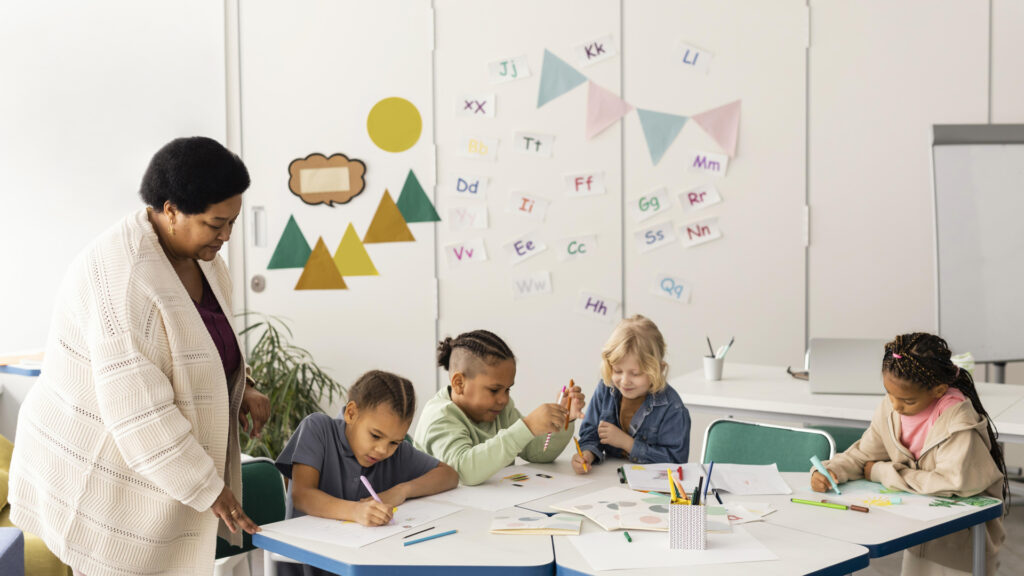 a classroom with kids and a teacher and decorations on the wall
