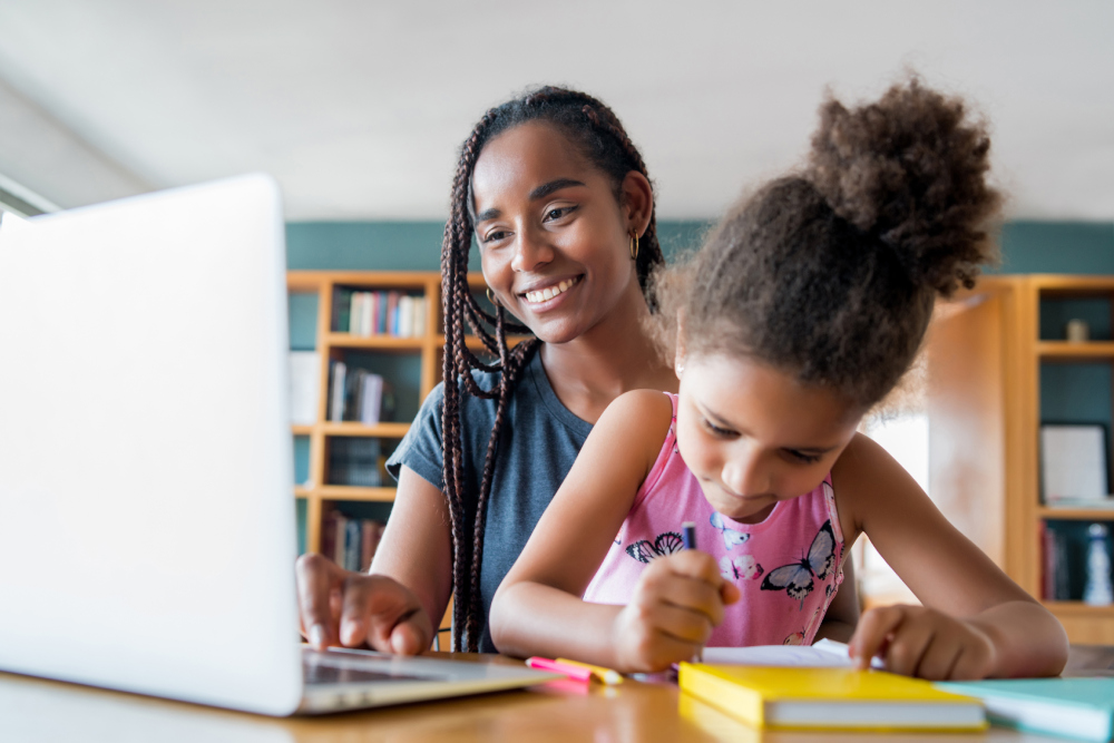 mother-helping-supporting-her-daughter-with-online-school-while-staying-home-new-normal-lifestyle-concept(1)